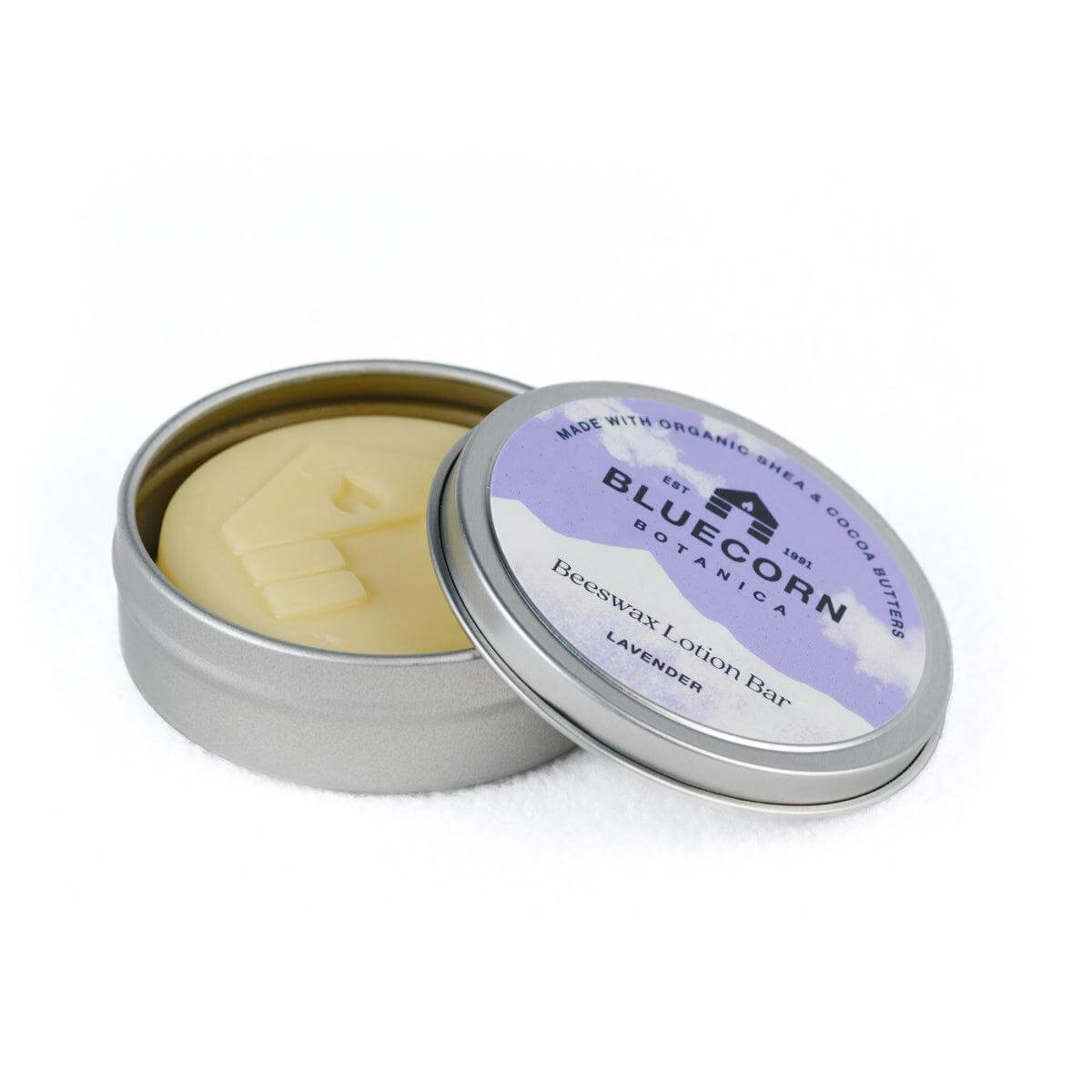 Bluecorn Beeswax Lotion Bars from Bluecorn Candles, apothecary-style natural beeswax cream bars in blue packaging.