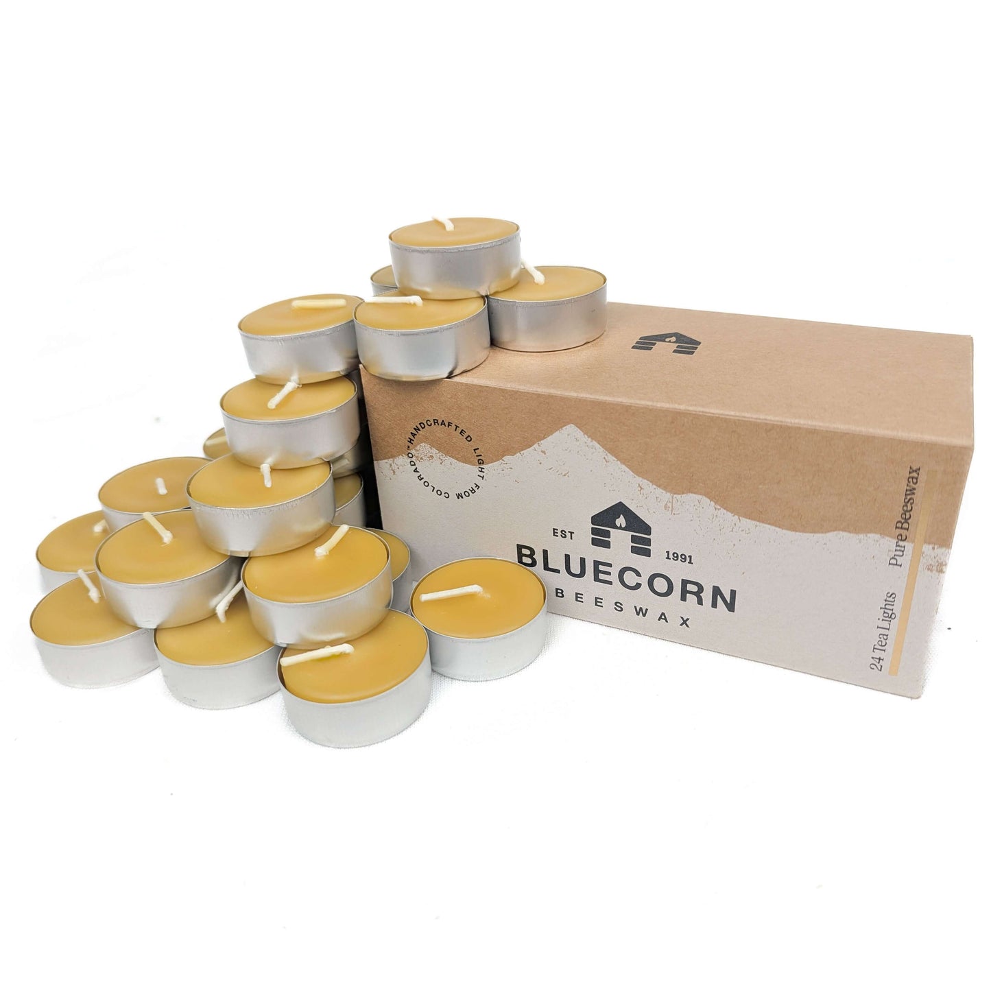 Pure beeswax tea light candles by Bluecorn Candles in metal cups, shown in a 24-pack on white background.