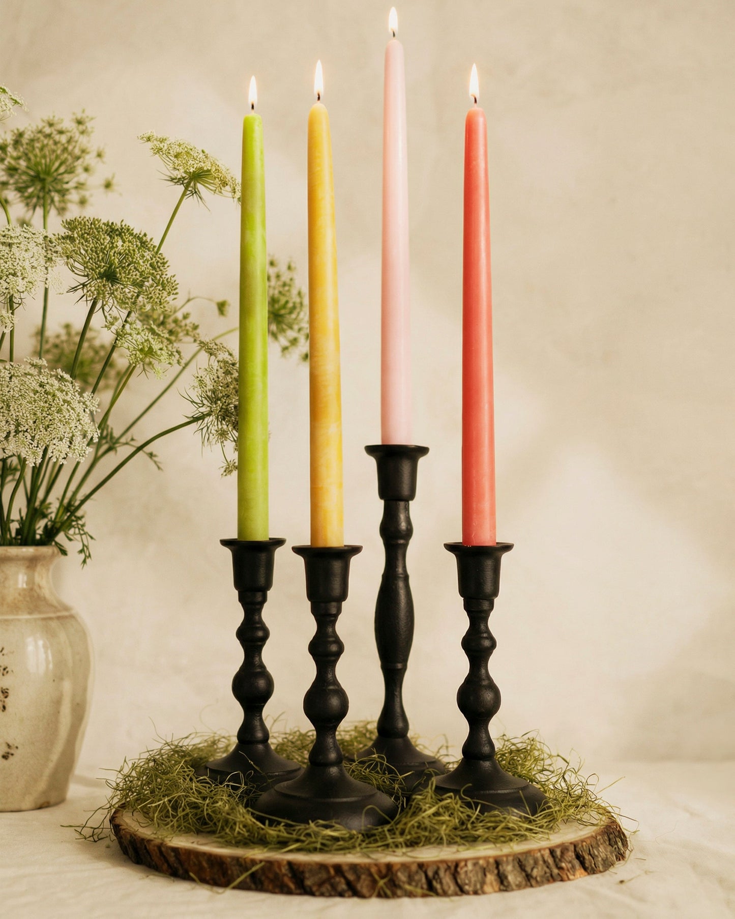 Spring beeswax taper candle bundle by Bluecorn Candles featuring dusty rose, apricot, pistachio, and raw colors.