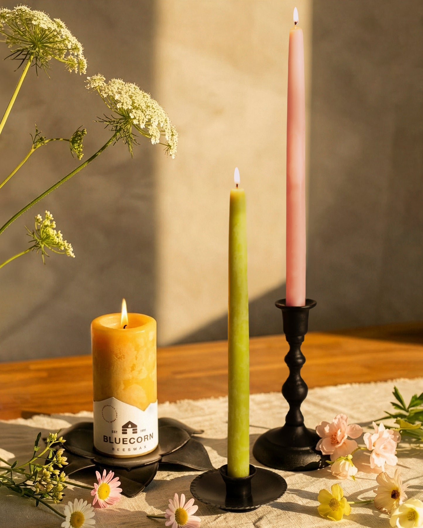 Spring Beeswax Taper Candle Bundle by Bluecorn Candles featuring dusty rose, apricot, pistachio, and raw-colored tapers.