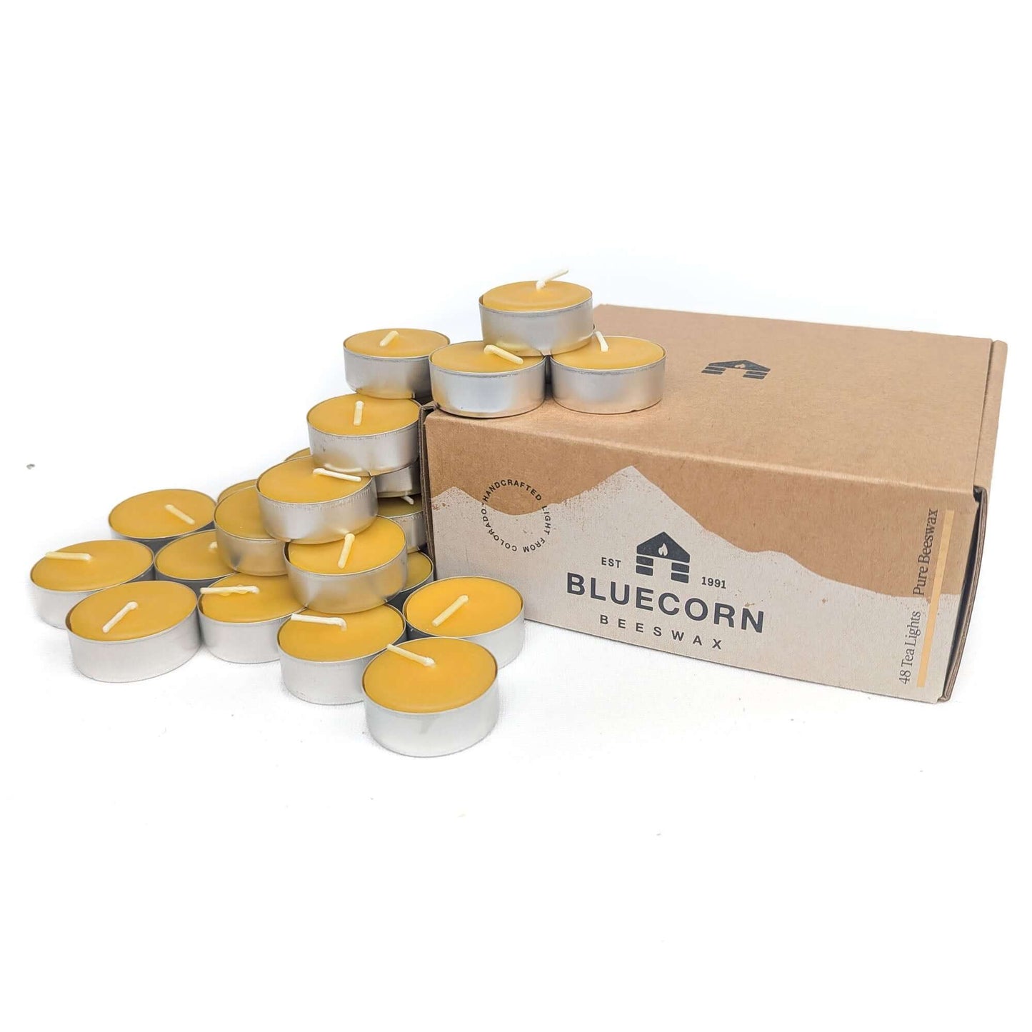 Bluecorn Candles pure beeswax tea light candles in recyclable metal cups, handmade in Colorado, shown in a 48-pack on white background.