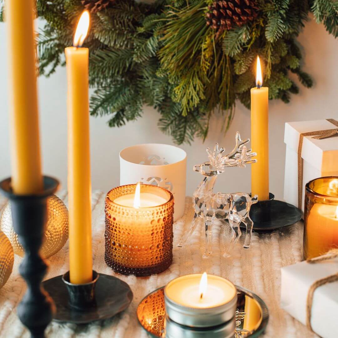 Bluecorn Candles hand-dipped beeswax taper candles in a bulk 4-pair bundle, featuring natural beeswax finish and classic taper shape.