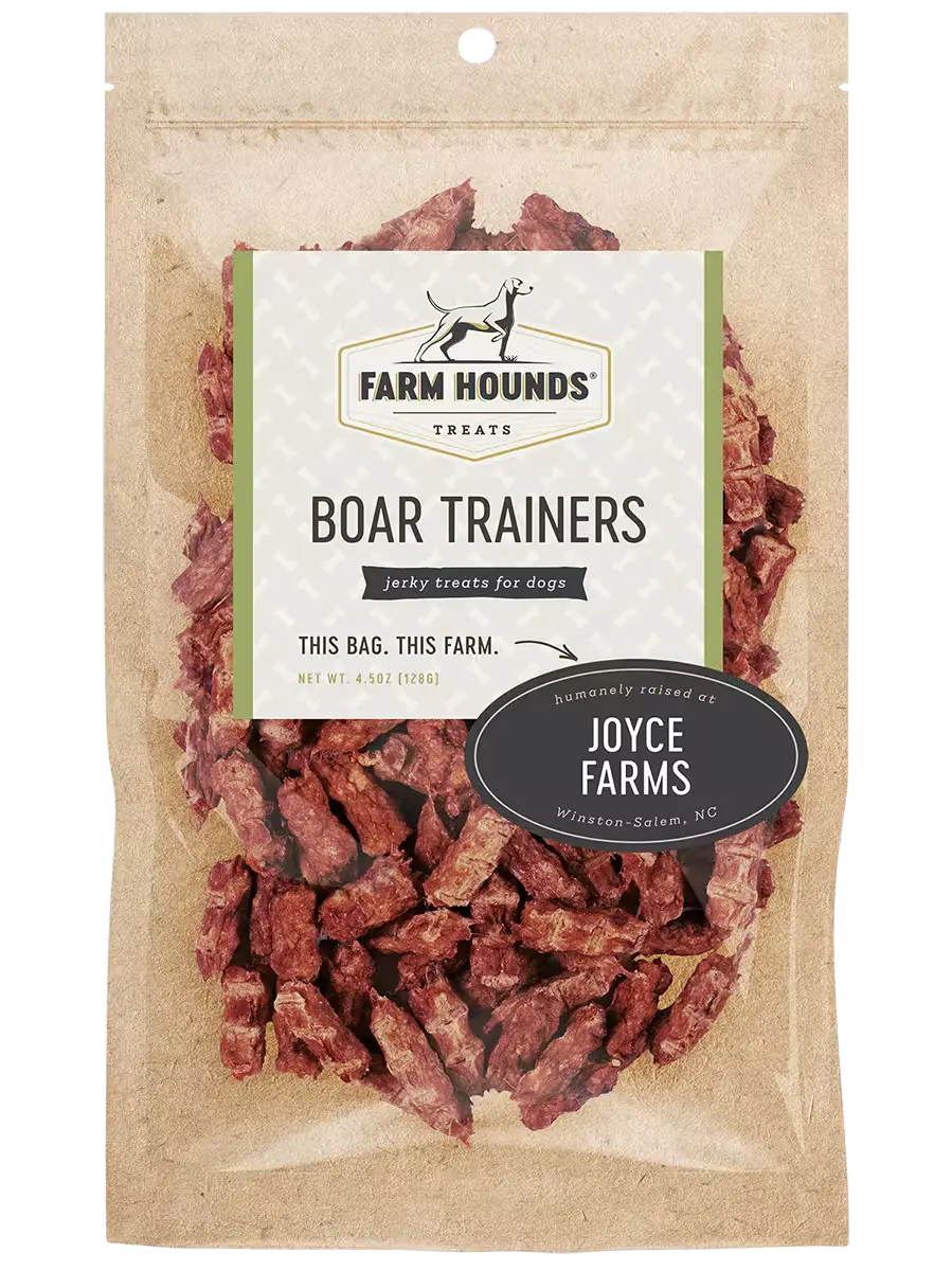 Farm Hounds boar trainers designed for training pigs, featuring durable straps and a secure fit for effective pig training.