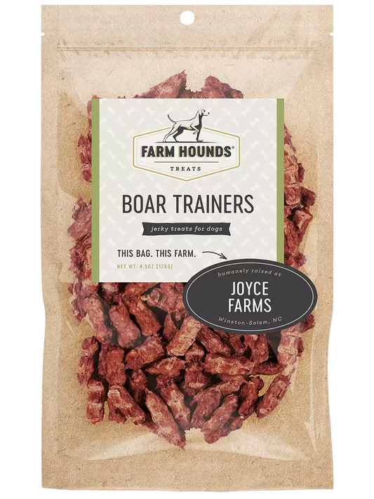 Farm Hounds boar trainers designed for training pigs, featuring durable straps and a secure fit for effective pig training.