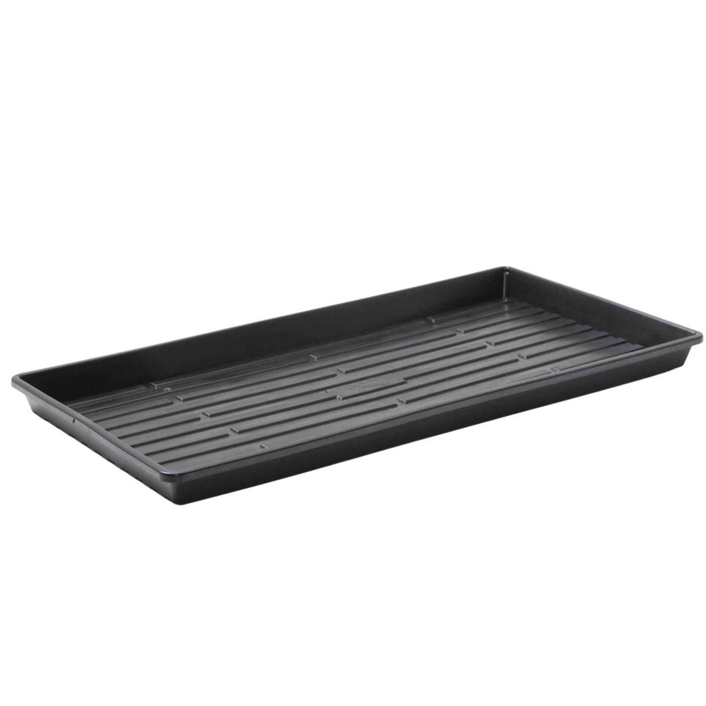Plastic rectangular seed tray showing parallel ridges and slightly raised edges against a white background

