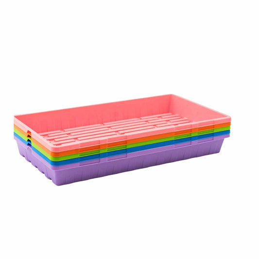 Plastic trays in pink orange green blue and purple hues stacked on a white background.