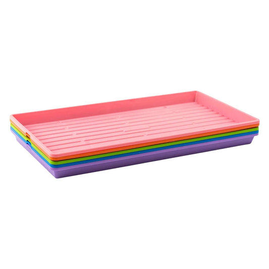 Plastic trays in pink, orange, green, and purple hues stacked on a white background
