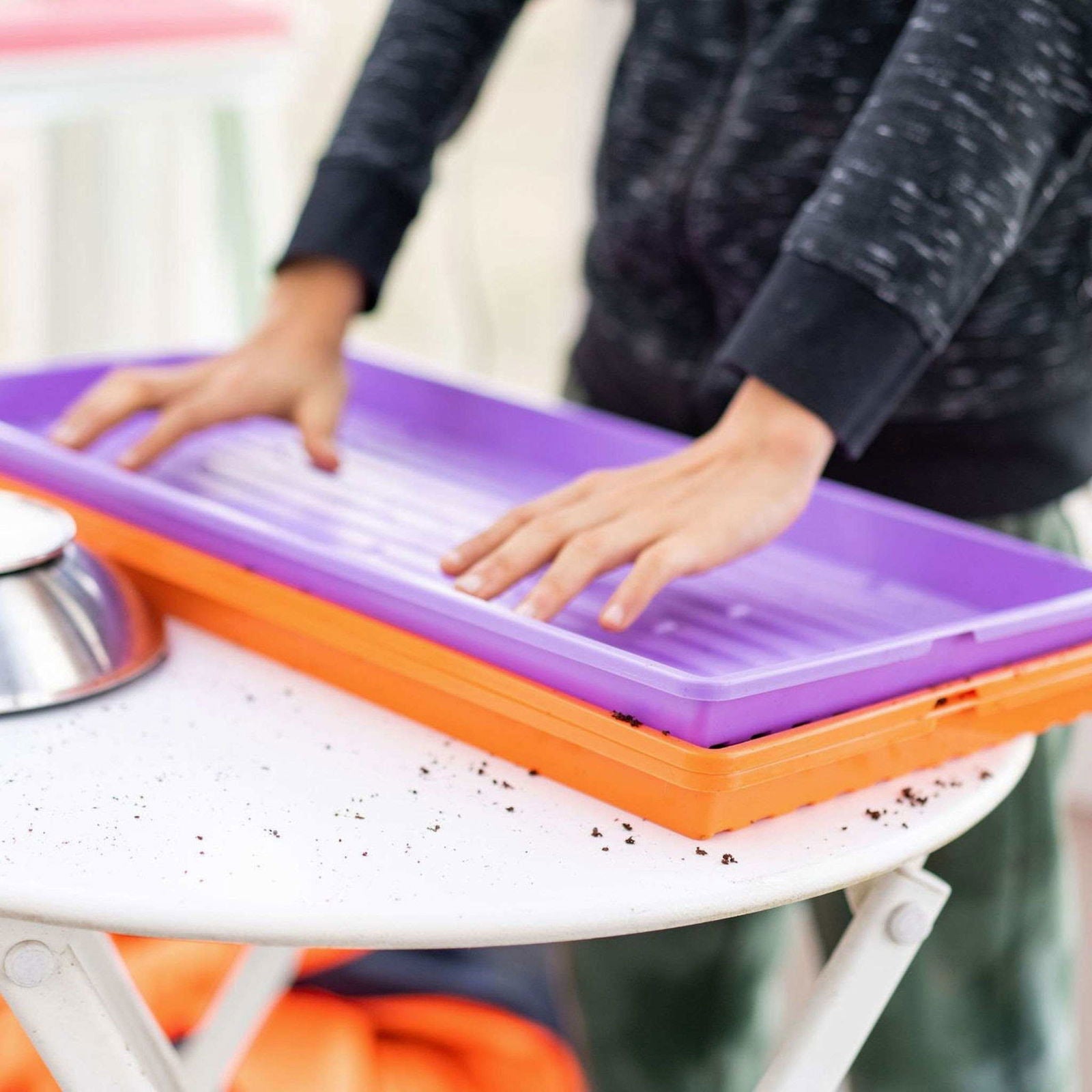 Bootstrap Farmer 1020 Microgreen Trays in vibrant colors, shallow extra strength design, ideal for growing microgreens.