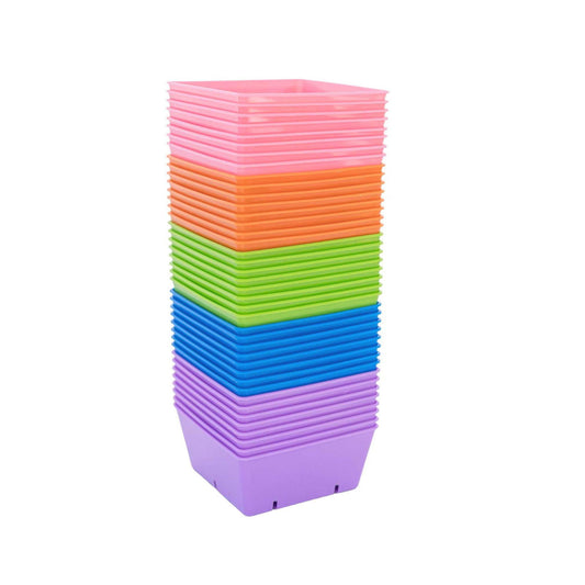 Plastic square containers stacked high in vibrant pink orange green blue and purple hues against a white background
