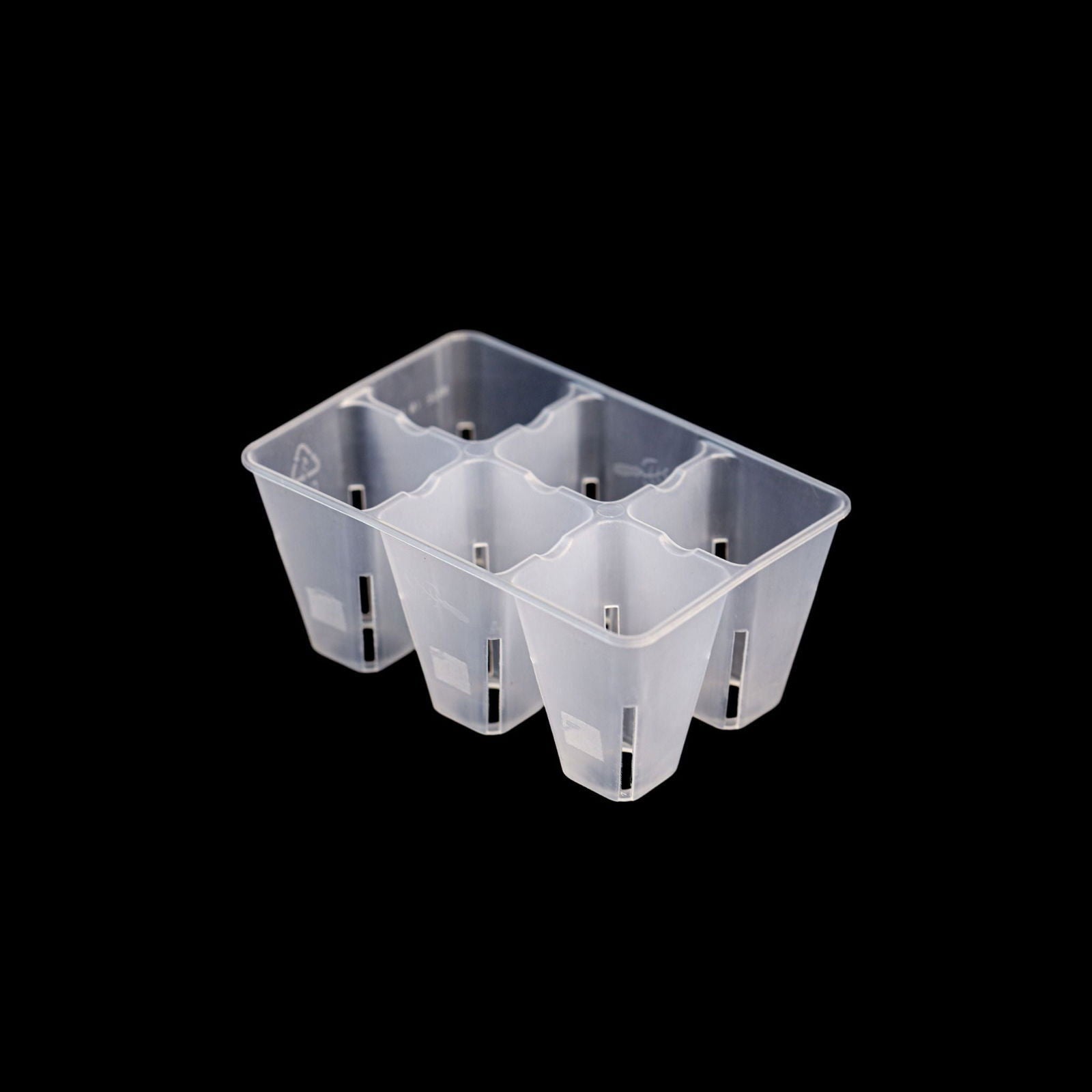 Bootstrap Farmer 6-cell plug tray inserts in various colors, used for starting seedlings and plant propagation.