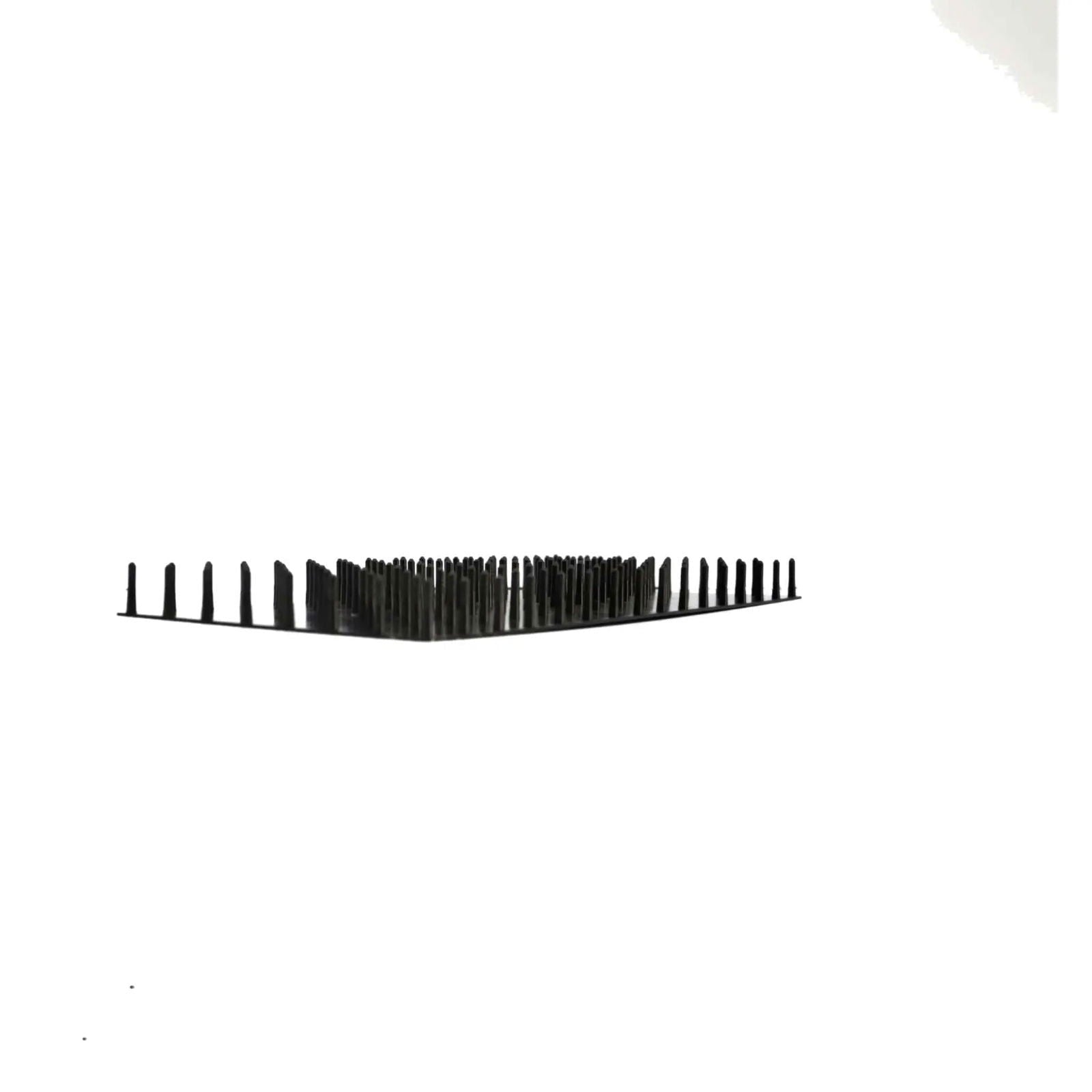 The Bootstrap Farmer Plug Popper for Cell Trays features short, black vertical spikes arranged in a square on a flat surface, centered against a plain white background.