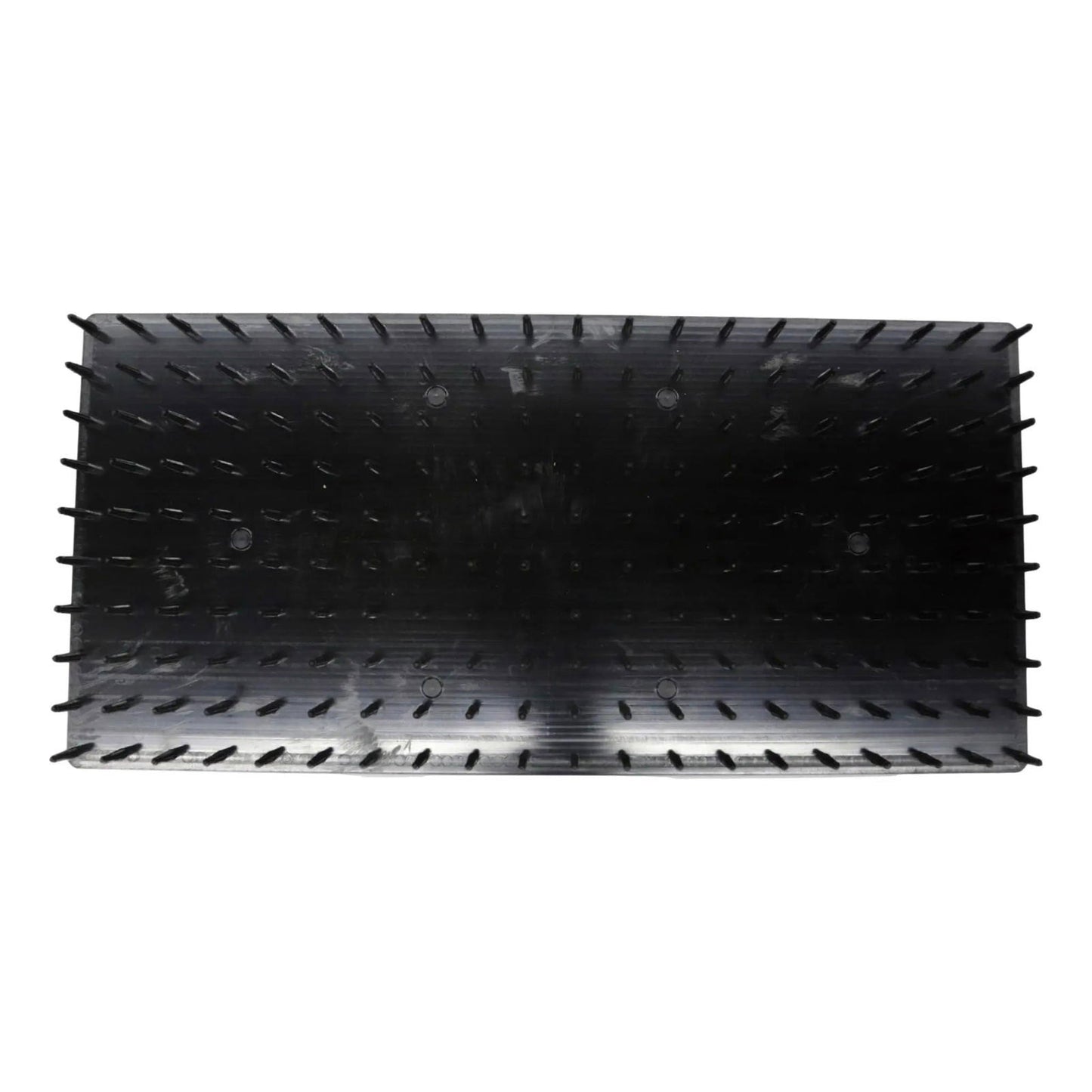 The Bootstrap Farmer Plug Popper for Cell Trays is a rectangular, black plastic tray seen from above, with rows of vertical slits and raised bumps lining the inner walls and base.