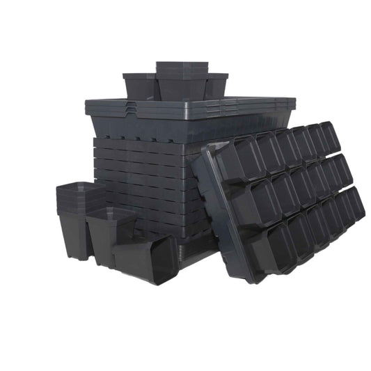 Plastic plant pots and containers various sizes and shapes stacked showing square and rectangular designs dark gray color
