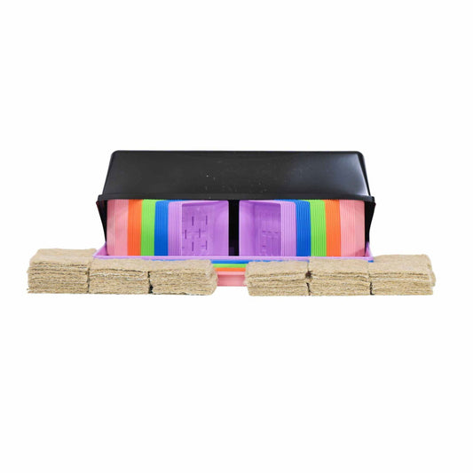Product shot showing a black plastic container holding stacks of colorful plastic seedling trays and beige jute seed starter plugs
