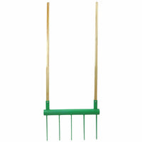 The Bootstrap Farmer Broadfork | USA Made features two wooden handles and five metal tines attached to a sturdy green bar, ideal for market gardeners to loosen soil and support soil health.