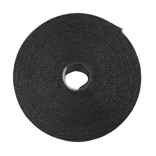 The Bootstrap Farmer Wellington Batten Tape for Greenhouse Plastic is shown unwound, viewed from above against a white background, highlighting its textured black surface and central hole. UV-resistant, it measures 1.75 x 300 ft and promises durability under various conditions.