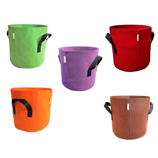 Fabric plant grow bags in green red orange purple and brown showing black handles and white labels against a white background
