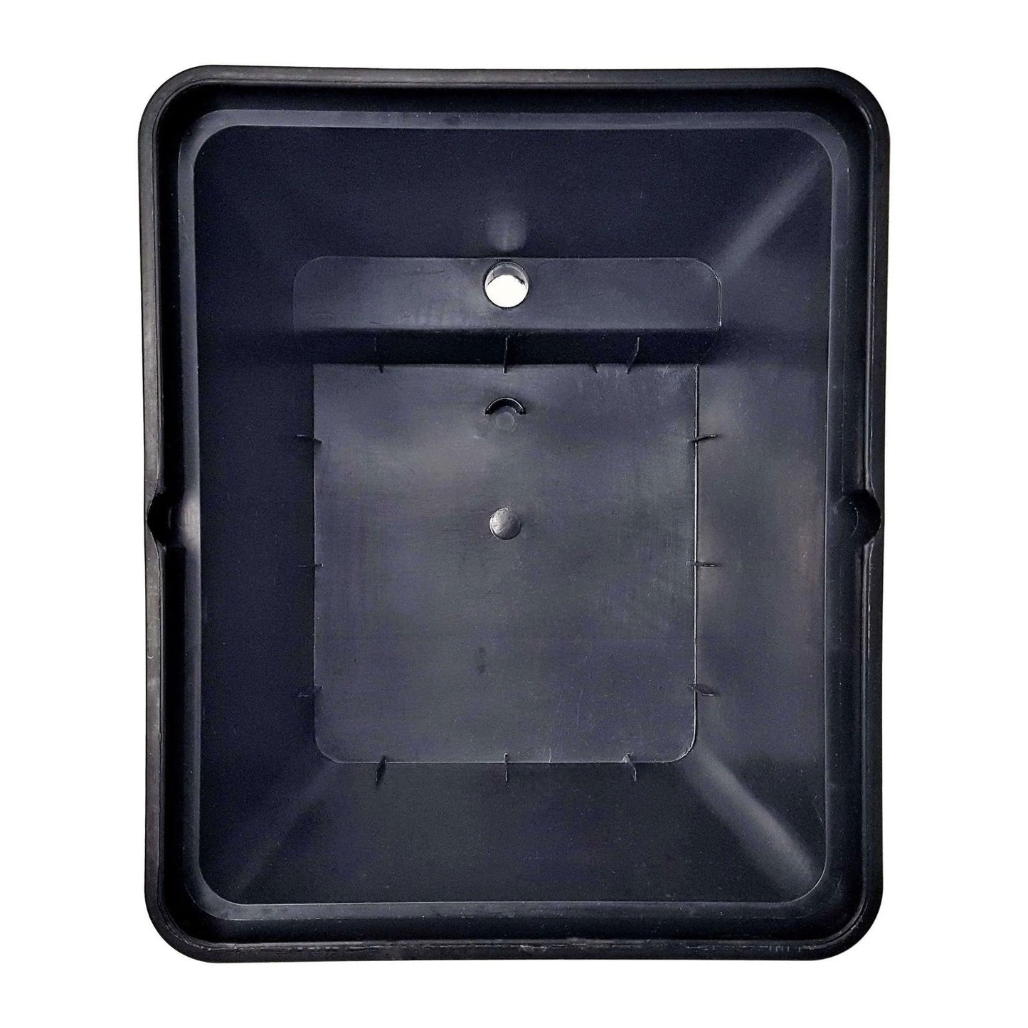 Plastic tray showing a dark gray interior with a central hole and molded details along its edges