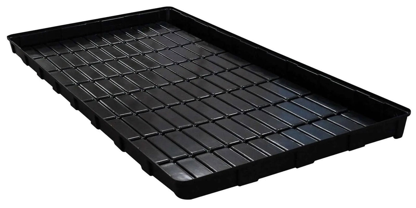 The Bootstrap Farmer Grow Rack Flood Tray, 4'x8' pallet size, is a large black plastic tray with raised edges and a grid-patterned bottom, perfect for vertical propagation or microgreens. Shown angled on a white background.