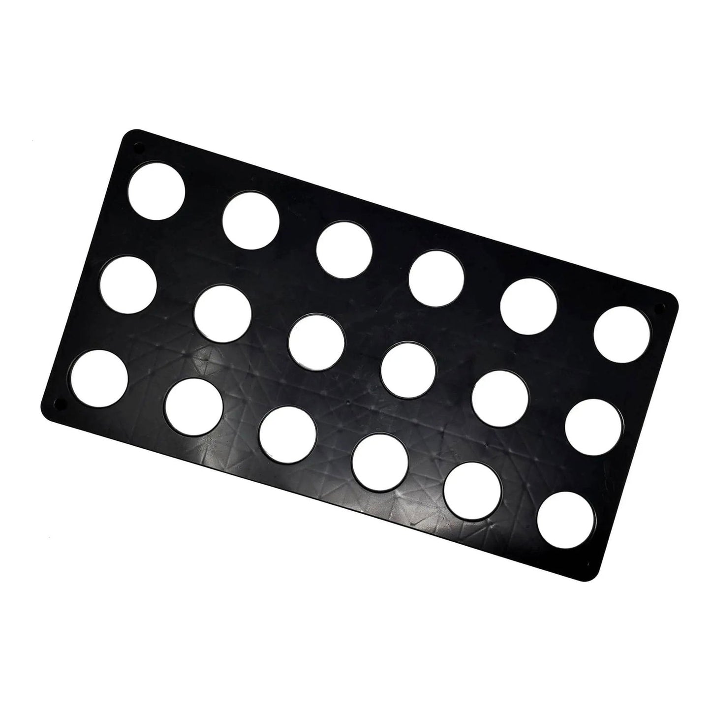 Black plastic sheet with sixteen circular cutouts and a textured geometric pattern showcasing a minimalist design
