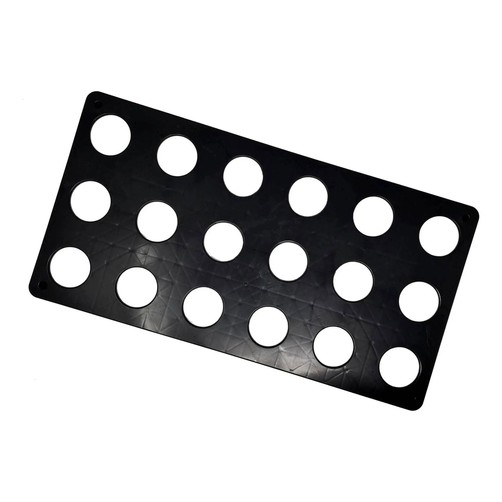 Black plastic sheet with sixteen circular cutouts and a textured geometric pattern showcasing a minimalist design
