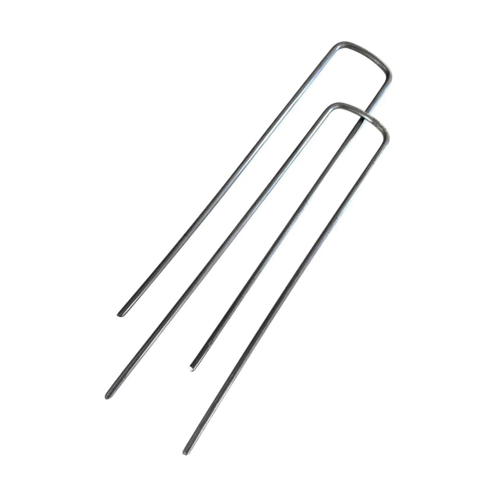 Product shot of three metallic U-shaped landscape staples against a white background showing their simple design and slightly reflective surface