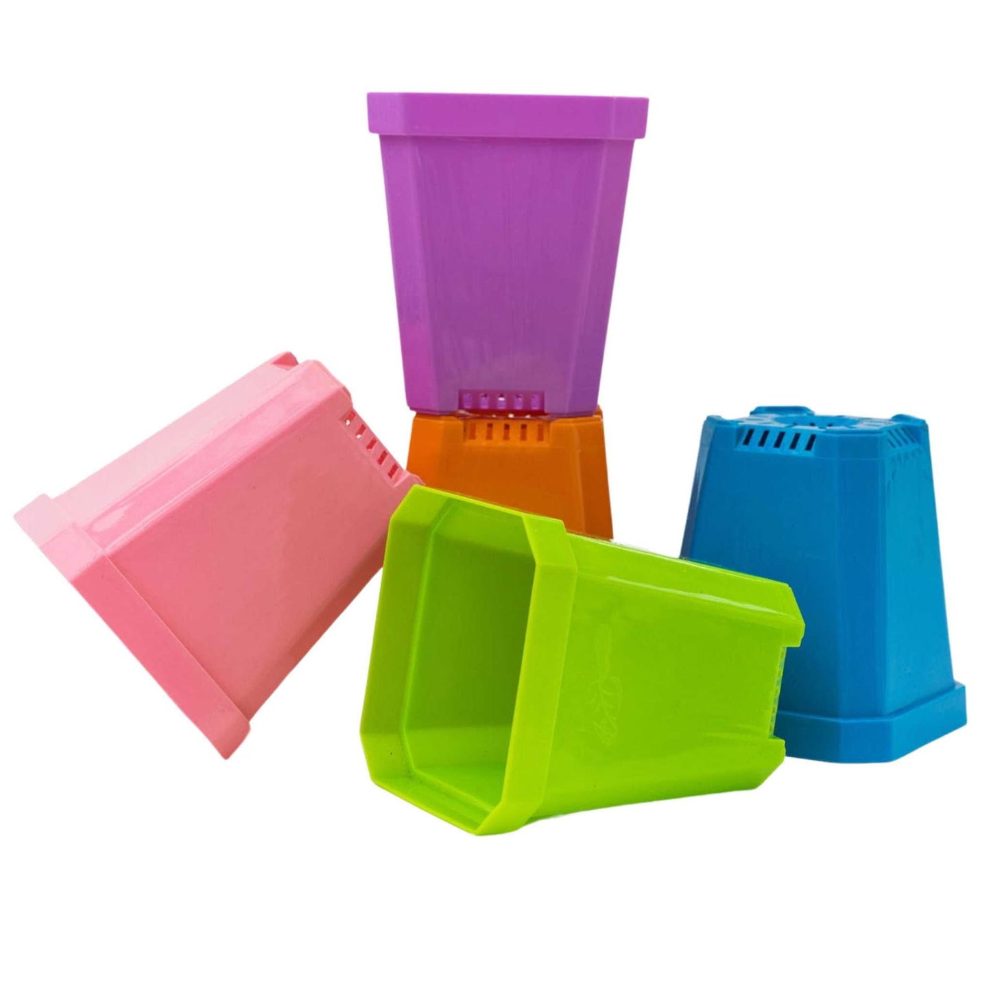 Four colorful Bootstrap Farmer 5" Heavy Duty Seed Starting Pots—pink, purple, orange, green, and blue—are stacked together on a white background, perfect for sturdy seed starting in your garden.