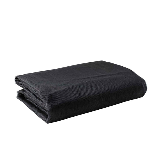 Black mesh fabric folded on a white background showing its dark gray and black textured weave