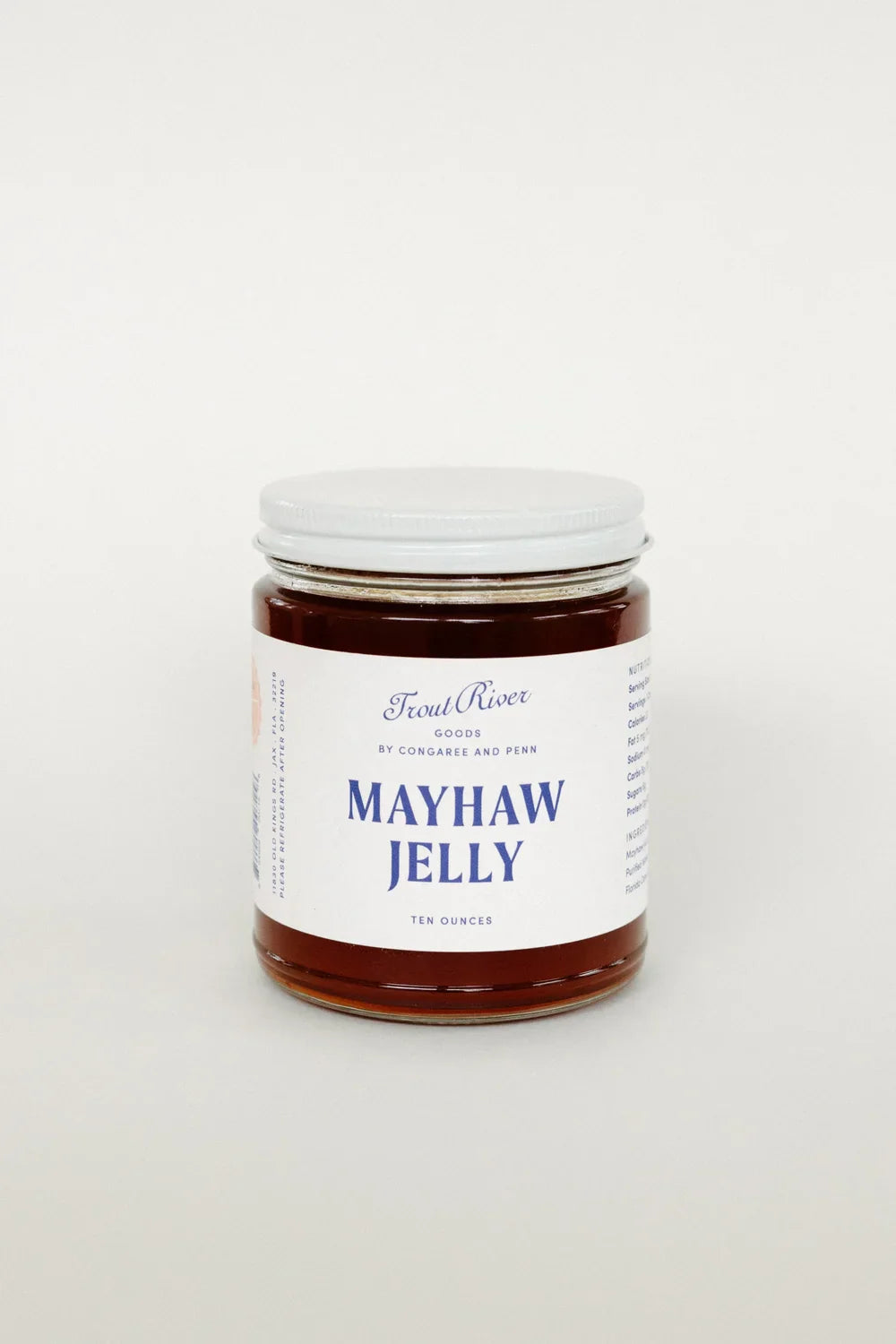 Jar of Congaree and Penn Mayhaw Jelly with a clear label, showcasing a vibrant, glossy fruit spread on a clean background.