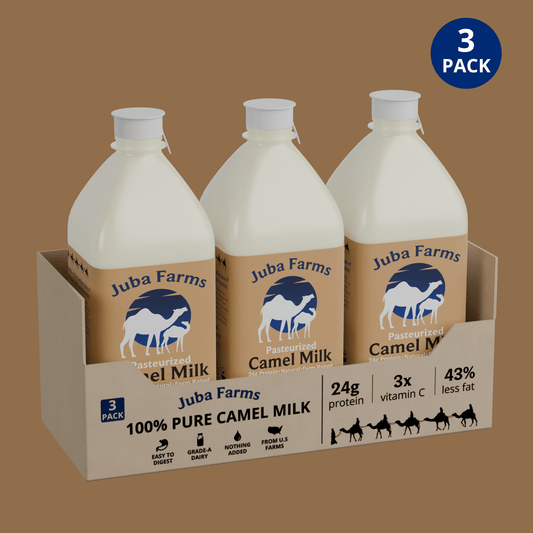 One-liter bottle of Juba Farms camel milk showing the clear, fresh milk in a transparent plastic container