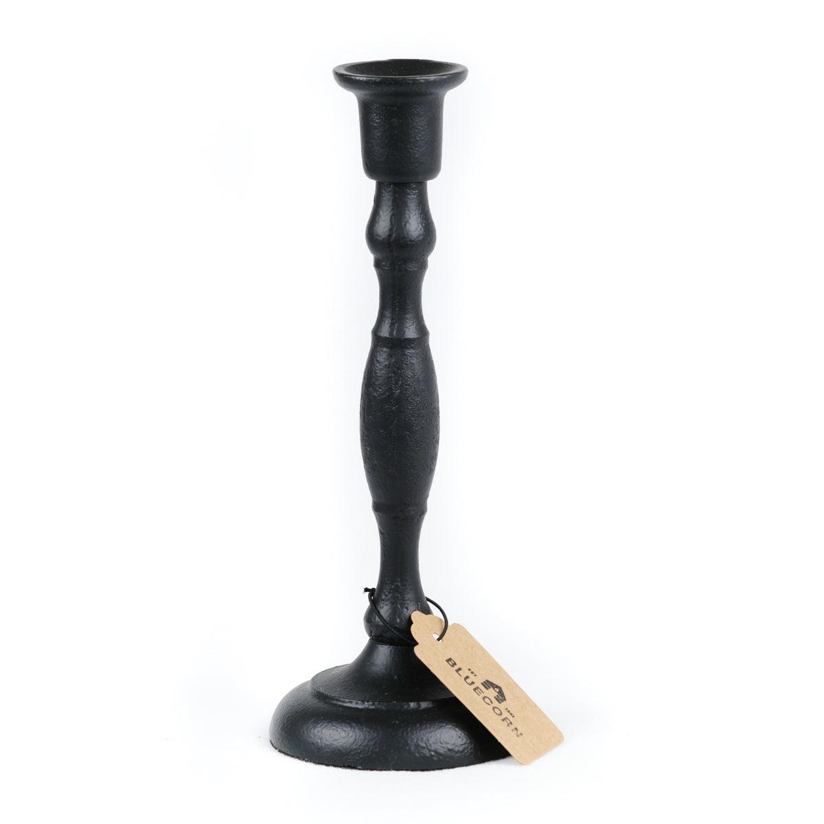Handcrafted cast iron taper candle holders from Bluecorn Candles, featuring classic design and sturdy, rustic finish.