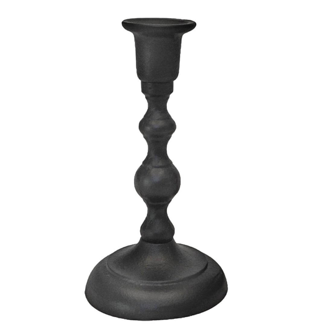 Pair of handcrafted cast iron taper candle holders by Bluecorn Candles, featuring a rustic, sturdy design for decorative candle display.