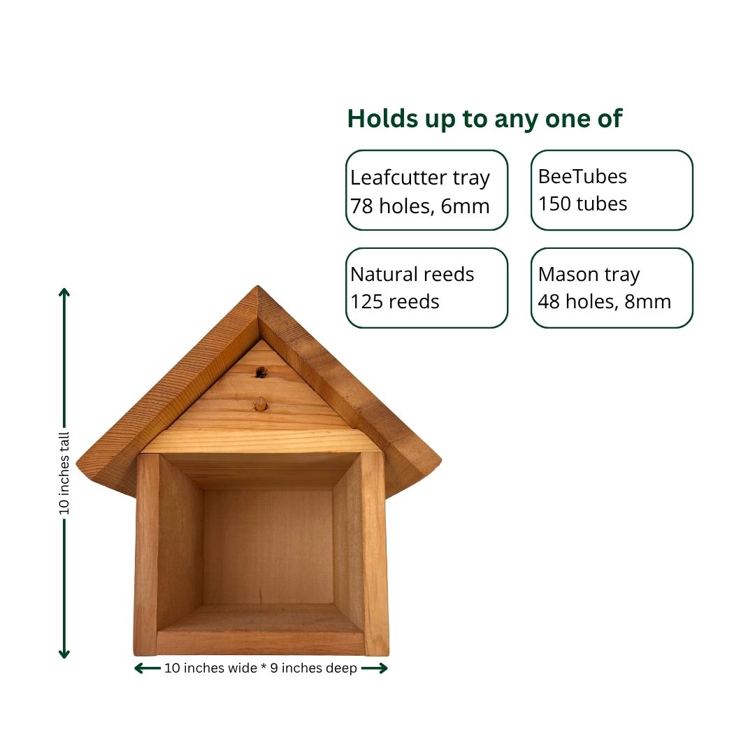 Cedar bee house with multiple nesting compartments and entrance holes, designed for solitary bees by CrownBees.