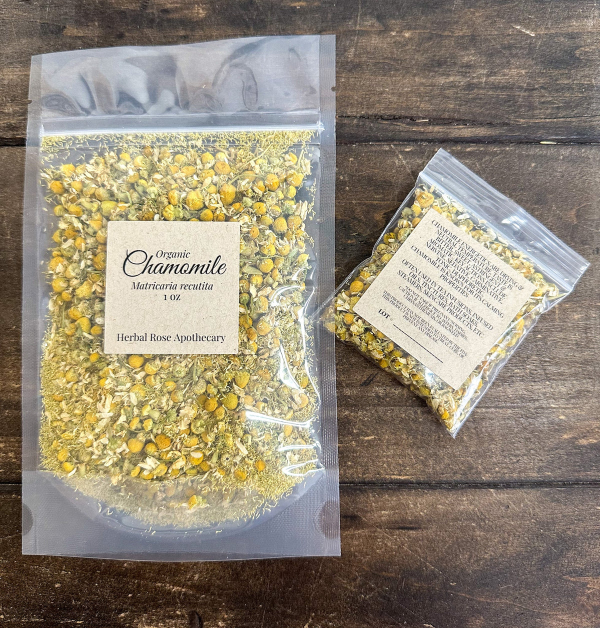 Dried organic chamomile herbs in a jar, by HerbalRoseApothecary, showing small dried flowers and leaves for herbal tea.