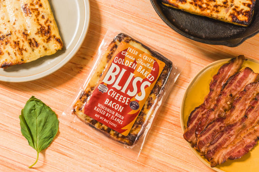 Baked Cheese from Cheese Brothers Inc. with crispy bacon bits, showcasing the Golden Baked Bliss Cheese in a single pack.