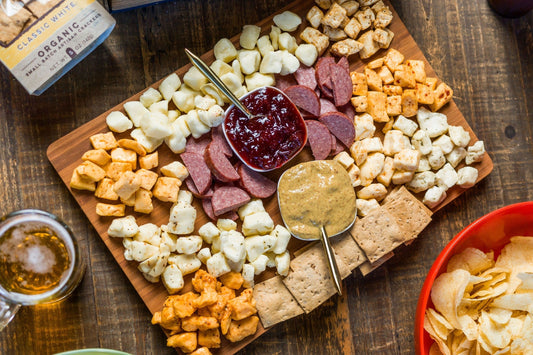 Deluxe Char-Curd-Erie Box gift set from Cheese Brothers Inc. featuring assorted cheeses and curated cheese gifts in a stylish box.