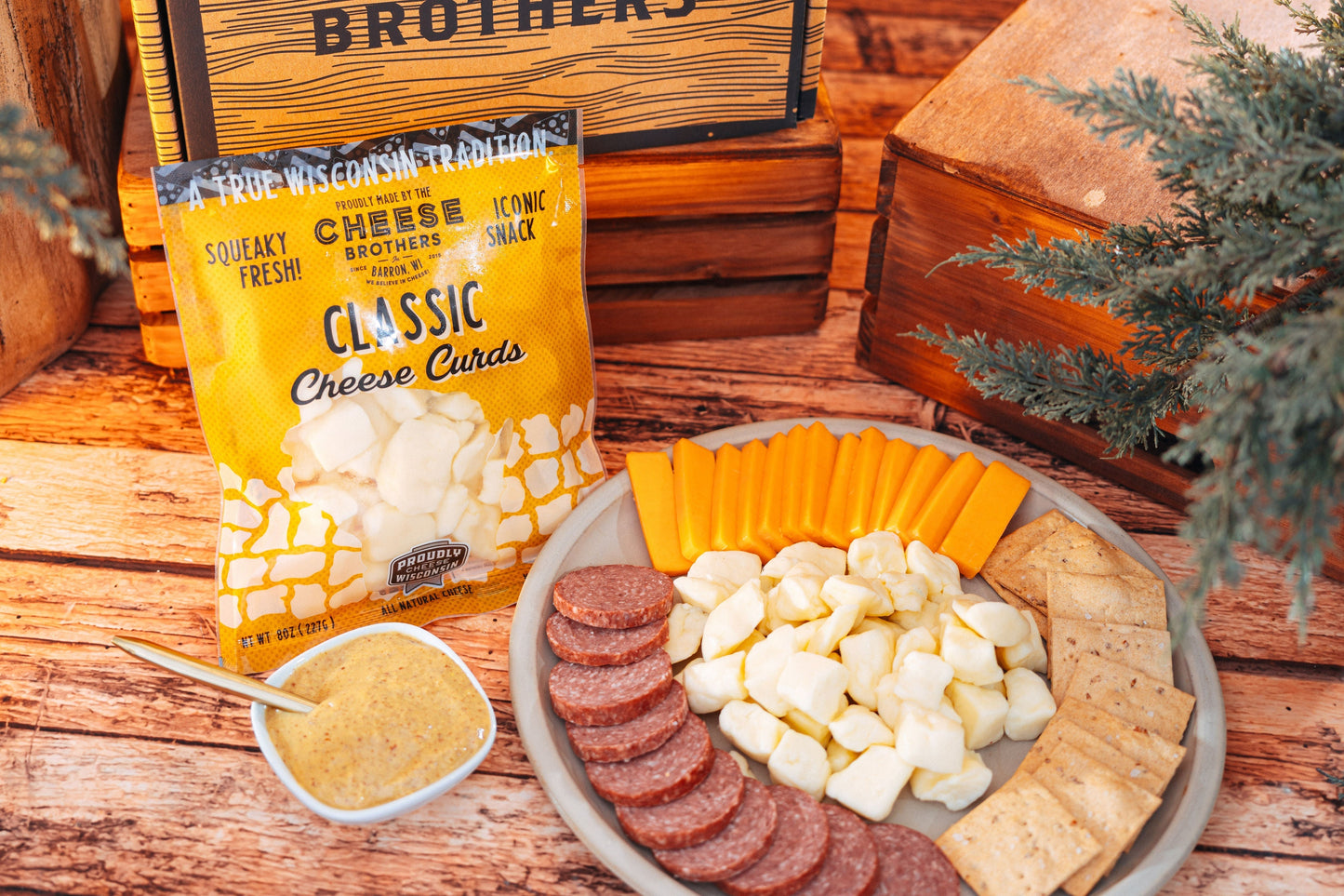 Deluxe Char-Curd-Erie Box from Cheese Brothers, Inc. featuring assorted cheeses and curated gift bundle in a decorative box.