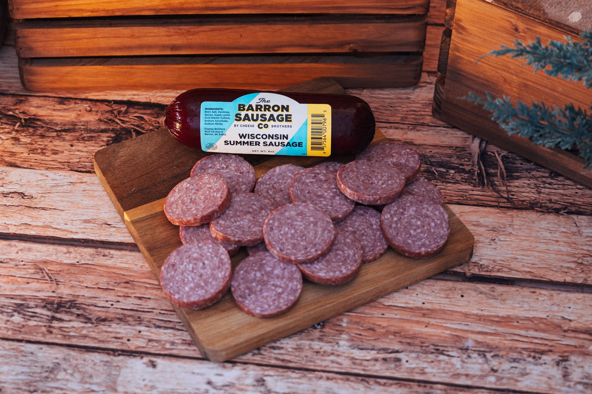 Deluxe Char-Curds-erie Box from Cheese Brothers Inc. featuring assorted cheese, charcuterie, and curated gourmet snacks in a gift bundle.