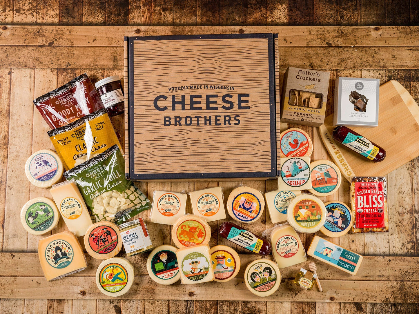 Cheese Brothers Inc. Just About Everything Box with assorted cheeses, snacks, and gourmet treats in a gift bundle.