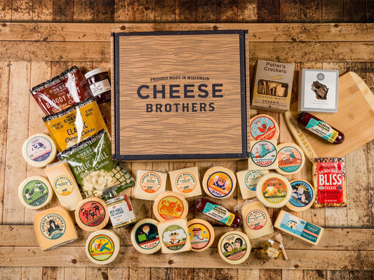 Cheese Brothers Inc. Just About Everything Box with assorted cheeses, snacks, and gourmet treats in a gift bundle.