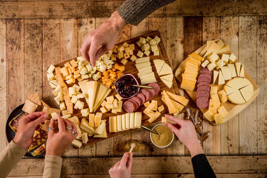 Cheese Brothers Inc. Just About Everything Box with assorted cheeses, snacks, and gourmet treats in a gift bundle.