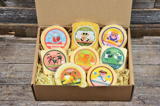 Cheese Brothers Inc. Brotherhood Cheese Assortment Pack with 8 varieties of gourmet cheeses on a wooden platter.