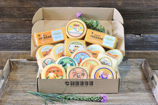 Assorted Wisconsin cheese sampler gift box from Cheese Brothers, Inc. featuring a variety of cheeses in a gift bundle.