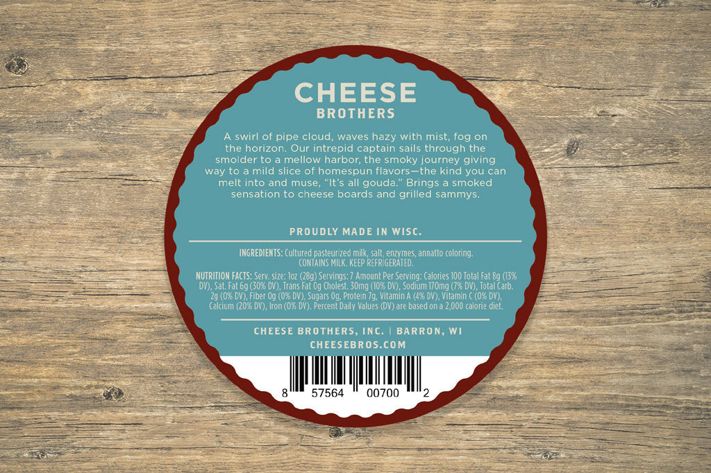 Slice of smoked Gouda cheese from Cheese Brothers, Inc., showcasing its rich, smoky flavor and smooth, yellow-orange appearance.