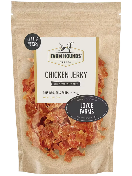 Farm Hounds chicken jerky with small, dried chicken pieces, showing the textured, natural look of the jerky in a close-up image.