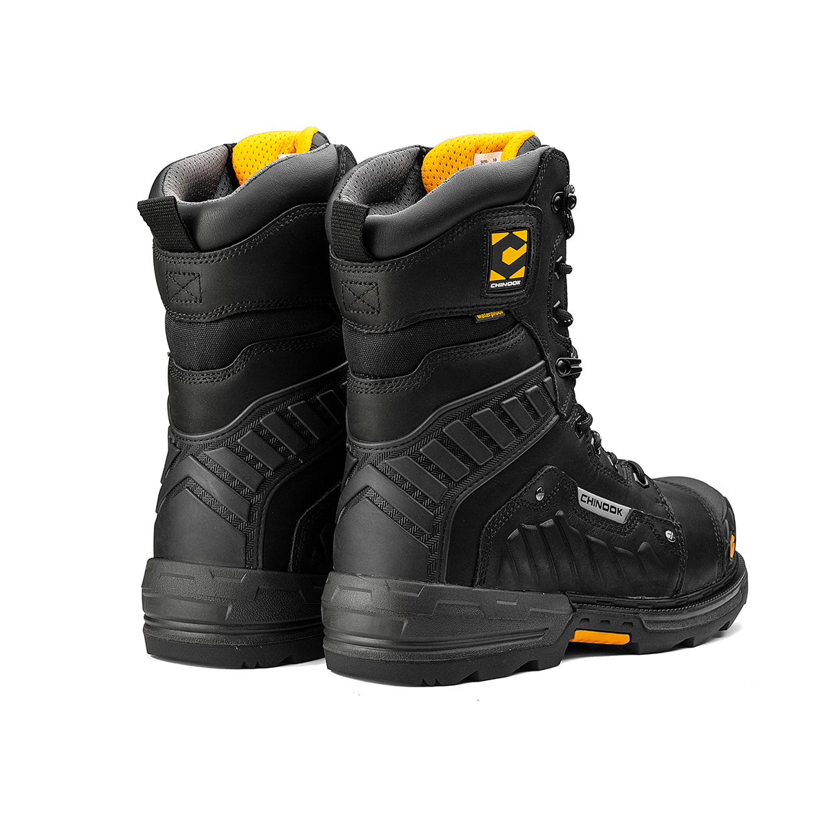 Two Chinook® Footwear Scorpion 9” Composite Toe Men’s Waterproof Work Boots in black, featuring yellow interior padding, side logo, reinforced rugged soles, and high-ankle design. The boots are shown highlighting the outer sides and backs.