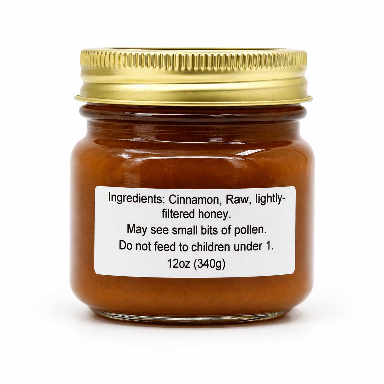 Cinnamon creamed honey in a jar from Lance Honey Farms, 12 oz, creamy texture with cinnamon spice visible in the product.