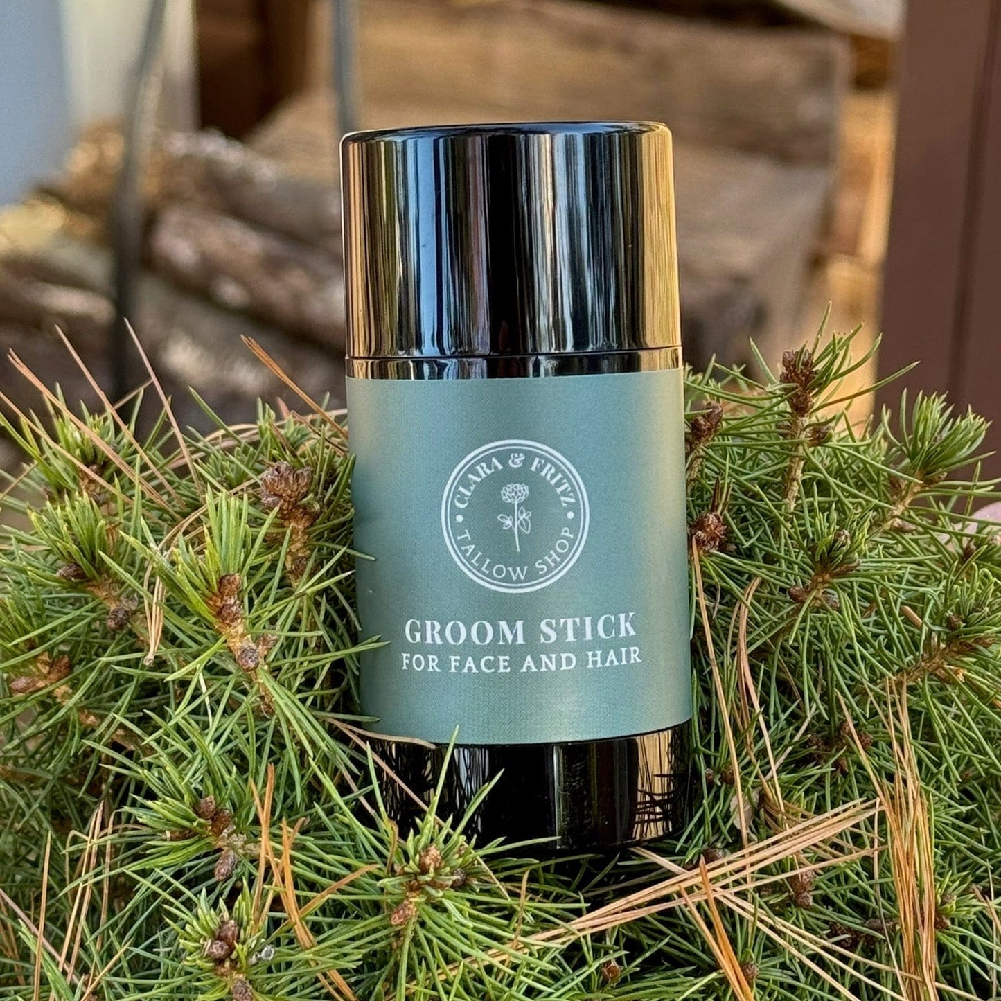 Clara & Fritz Tallow Shop Groom Stick, a natural grooming product for pets, with a stick and grooming ingredients visible.