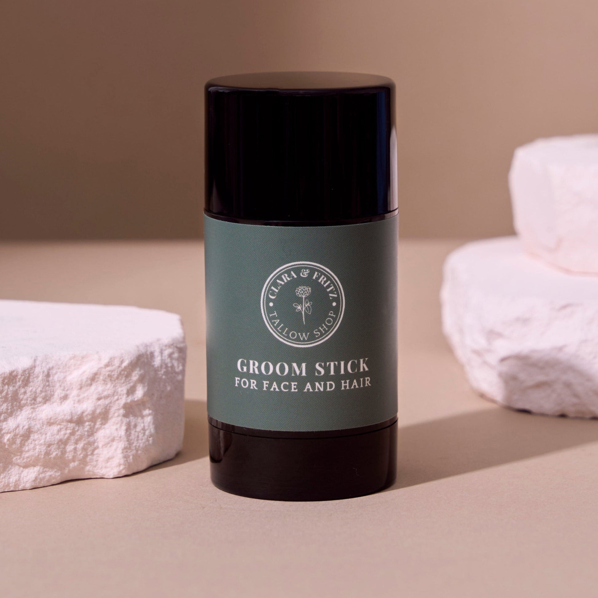Clara & Fritz Tallow Shop Groom Stick showing a natural grooming product in a sleek container for pet care.