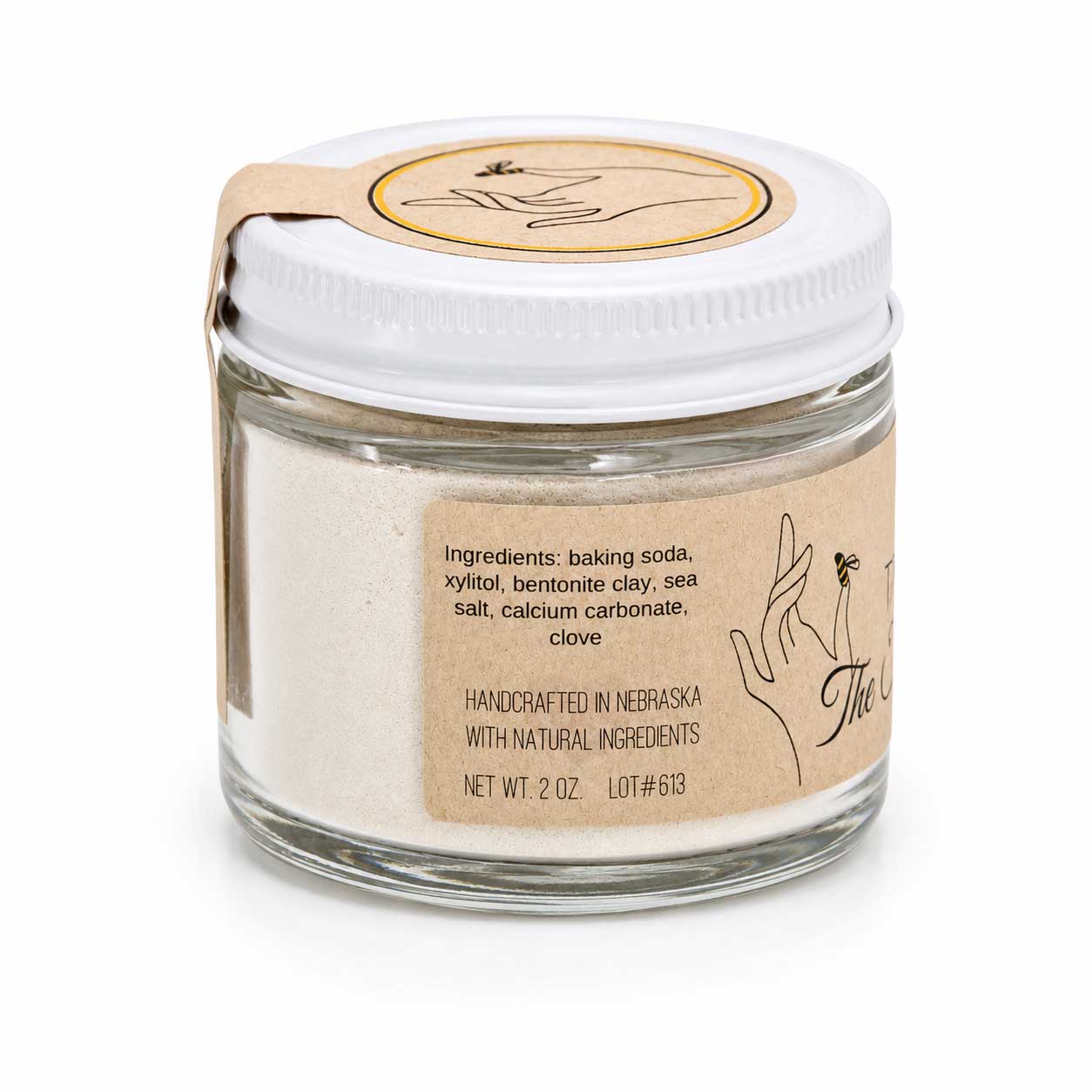 Clove-flavored tooth powder in a 2 oz jar from The Salvy Lady, fluoride-free, part of BuyNebraska.com’s bath and body collection.